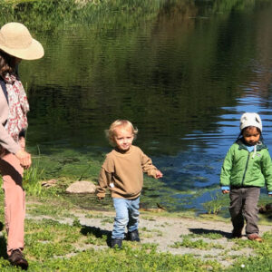 Teacher walking with toddler children by Lake Temescal