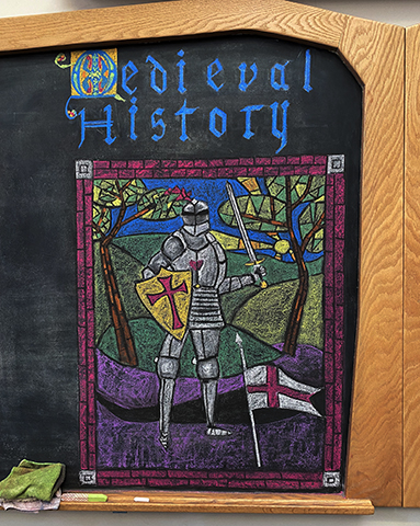 Chalkboard drawing of a knight for 6th grade Medieval History block