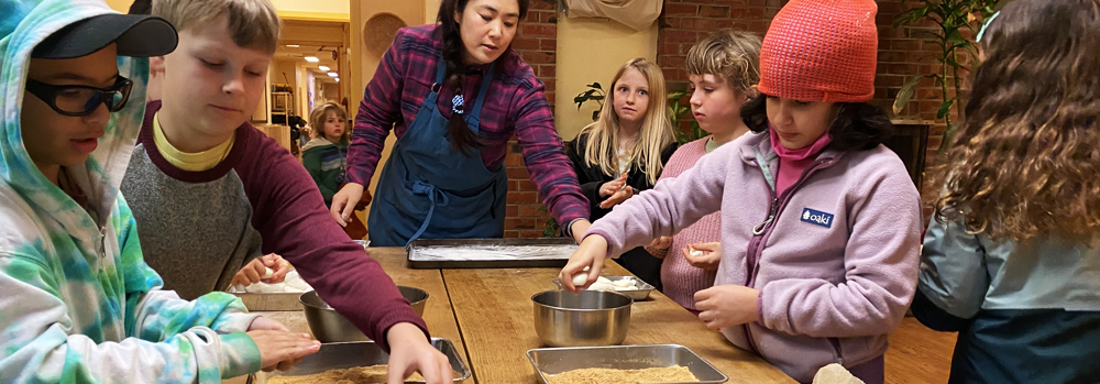 3rd grade students making mochi for New Years