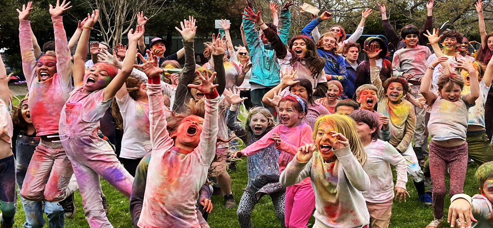 picture of kids covered in colors for Holi celebration