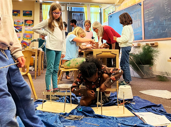 Third grade student build model shelter